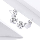 Boucle d'oreille en forme de trèfle