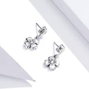 Boucle d'oreille en forme de trèfle