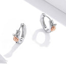 Boucle d'oreille fleur rose gold