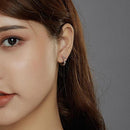 Boucle d'oreille fleur rose gold