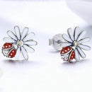 Boucles d'oreilles en forme de marguerite