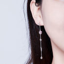 Boucles d'oreilles fleur pendante