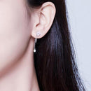 Boucles d'oreilles fleur pendante