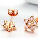 Boucles d'oreilles fleurs or rose
