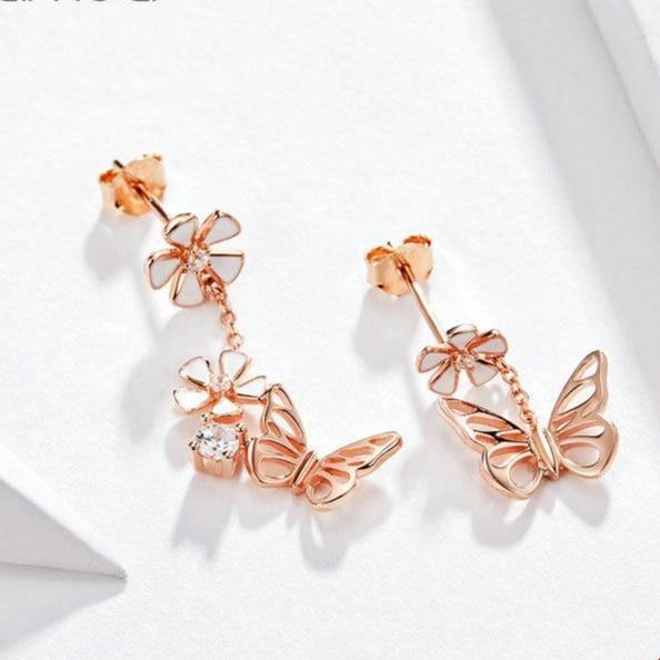 Boucles d'oreilles pendantes fleurs et papillons