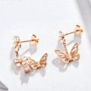 Boucles d'oreilles pendantes fleurs et papillons