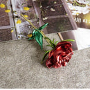 Broche avec fleur rouge