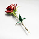 Broche avec fleur rouge