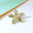 Broche fleur avec perle