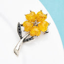 Broche fleur jaune