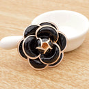 Broche fleur noire