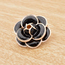 Broche fleur noire