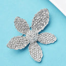 Broche fleur strass