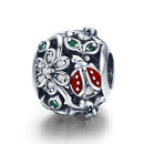 Charm fleur coccinelle argent