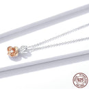 Collier avec pendentif fleur rose