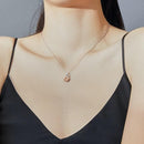 Collier avec pendentif fleur rose