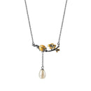 Collier fleur coccinelle