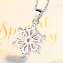 Collier fleur or blanc