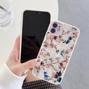 Coque iPhone aux imprimés fleuris