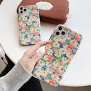 Coque iPhone fleurie de marguerites
