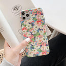 Coque iPhone fleurie de marguerites