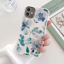 coque iPhone fleurie de peinture