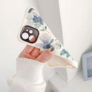 coque iPhone fleurie de peinture
