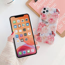 Coque iPhone fleurs brillantes