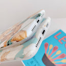 Coque iPhone fleurs brunes