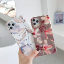 Coque iPhone fleurs colorées