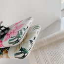 Coque iPhone motifs feuilles & fleurs