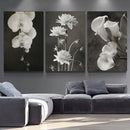 Tableau fleurs blanches sur fond noir