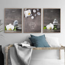 Tableau galets et fleurs zen