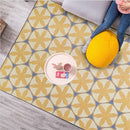 Tapis fleuri jaune géométrique