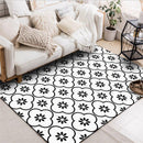 Tapis fleuri noir et blanc